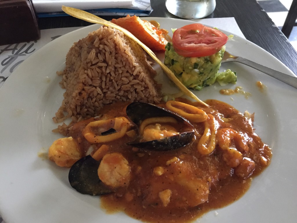 I don't usually take pictures of my food but...this is Filete Marinero - fish fillet with shrimp, octopus, and scallops. Served with guacamole and a banana with hot sauce on it!